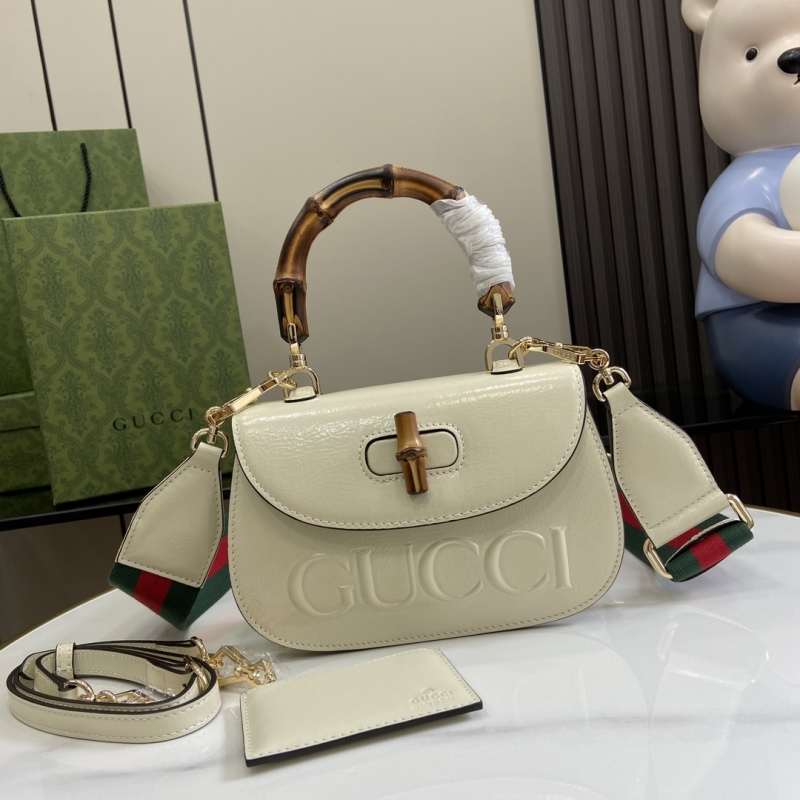 G*u*i top handle bags